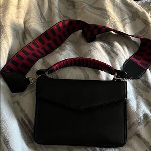 Les Petits Jouers Elegant Black Crossbody Bag with Red Accents
